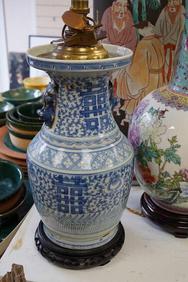 Two Chinese porcelain vases converted to lamps, together with a stick stand (repaired), largest 78cm high overall. Condition - lamps fair to good